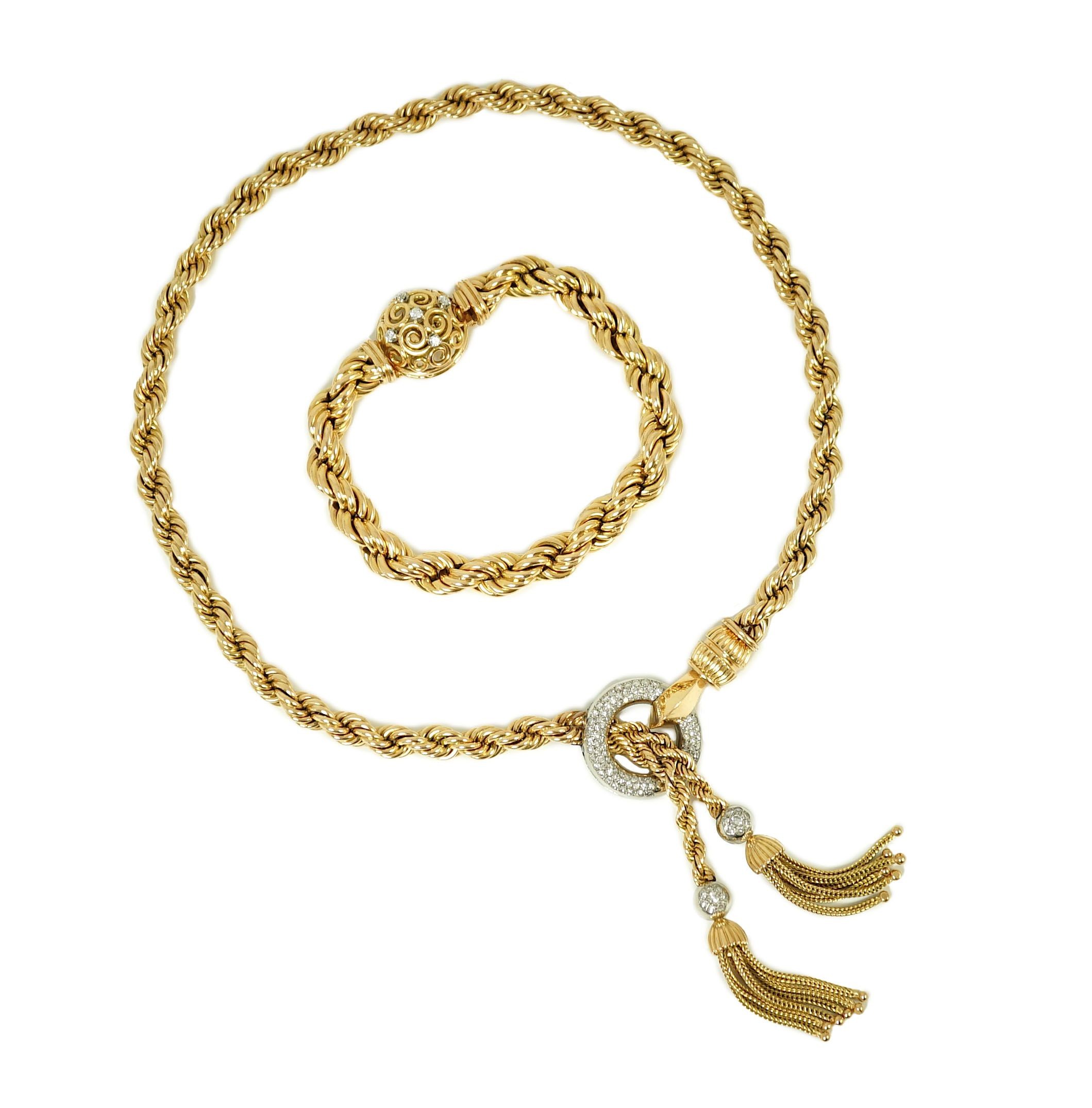 A modern heavy Middle Eastern gold and diamond set rope twist drop tassel necklace, together with a similar gold and diamond set bracelet